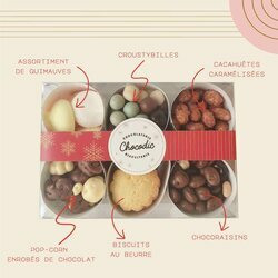 Coffret 6 timbales de Nol compos d'un assortiment de guimauves, de pop-corn enrobs de chocolats, de croustybilles, de cacahutes caramlises, de chocoraisins et de biscuits au beurre.
